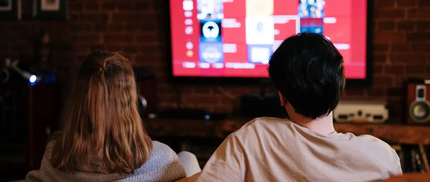 Couple watching Prime Video streaming entertainment at home