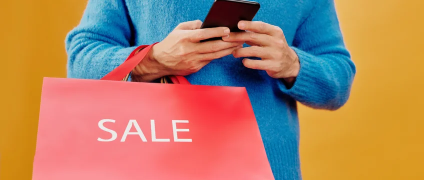 Shopper checking SHEIN discounts and savings on a smartphone in South Africa