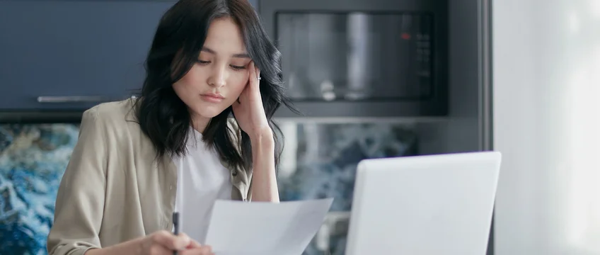 South African student reviewing university tuition and funding paperwork